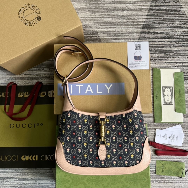 G*u*i top handle bags
